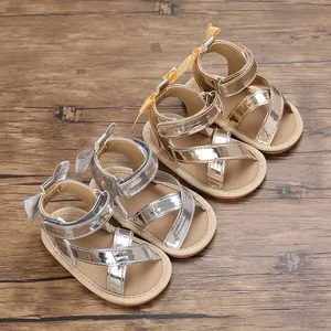 Sandales pour bébé en or et argent avec nœud élégant et semelle souple pour marche
