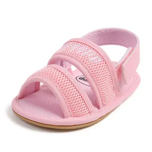 Detailed view of pink breathable mesh baby sandals with secure Velcro straps and soft soles.