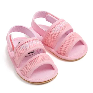 Close-up view of breathable pink mesh baby sandals featuring soft flexible soles