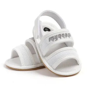 Detailed view of white breathable mesh baby sandals with flexible soft soles for infants