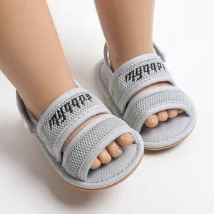 Breathable grey mesh infant sandals with soft non-slip soles for walking toddlers