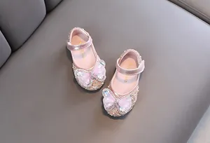 Zapatos de princesa rosas para niña con gran lazo de pedrería y detalles de malla