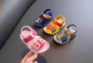Detailed view of baby summer sandals in pink, blue, yellow, and grey colors