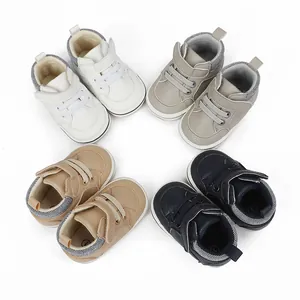 Assorted colors of soft leather baby walking shoes displayed in a circular pattern.