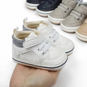 Detailed view of white soft-soled baby walker shoes for infant boys aged 0-1 years.