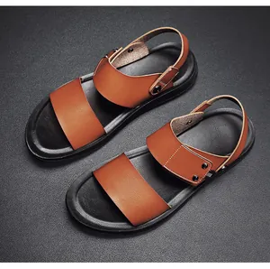 Top-down view of premium brown men's leather sandals with durable black soles