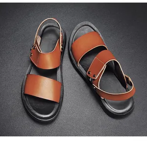 Top-down view of classic brown men's leather sandals with durable black soles