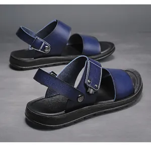 Close-up of premium navy blue men's leather sandals with durable rubber soles