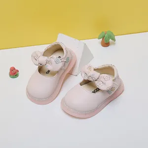 Pink baby girl princess shoes with floral bow detail and soft sole for toddler walking