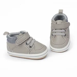 Hochwertige graue Baby-Lauflernschuhe aus Kunstleder mit verstellbarem Riemen