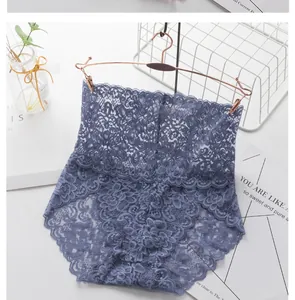 Detail view of high-waisted floral lace panties in blue with elegant scalloped edges