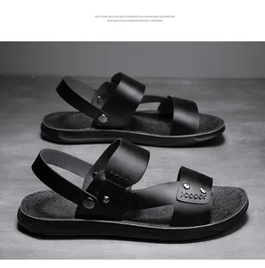 Vue latérale de sandales en cuir PU noir pour hommes avec semelle légère en EVA