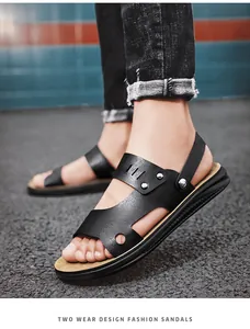Detail of men's black PU leather dual-wear sandals with metal rivet decor.