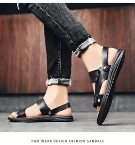 Detailed side view of stylish men's black leather two-wear sandals with non-slip sole