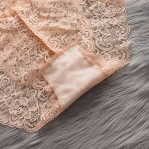High-quality detailed view of peach lace panties with comfortable cotton lining