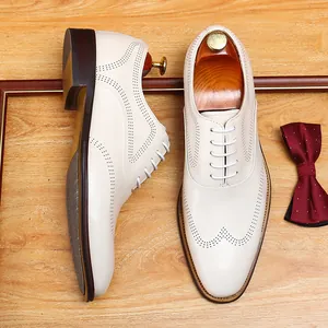 Classic men's white leather wingtip brogue shoes for business and formal occasions