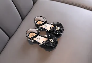 Elegantes zapatos de princesa negros para niñas con flor de tul y tacones con strass brillantes