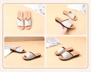 Detailed view of beige genuine leather slides with non-slip sole for daily comfort.