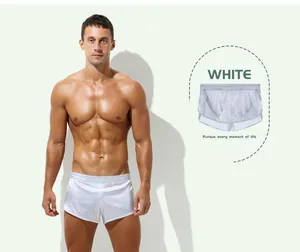 Silky white men's boxer shorts featuring a comfortable elastic waistband for home use
