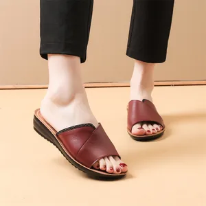 Elegant burgundy genuine leather flat sandals for women featuring comfortable summer casual style