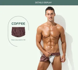 Close-up detail of coffee-colored silk-like faux two-piece men's boxer shorts on model