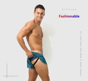 Close-up detail of silky men's fake two-piece boxer shorts for comfortable home sleepwear.
