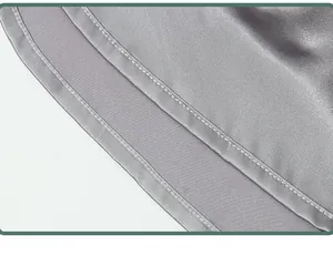 Detailed close-up view showing the high-quality stitching on silky grey men's satin underwear