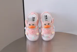 Pink light-up baby sandals with cute cartoon duck design and soft sole for toddlers.