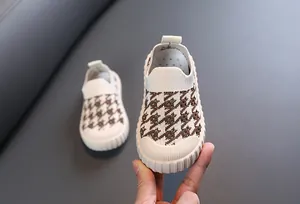 Detailed view of breathable houndstooth knit shoes for toddlers with slip-on design