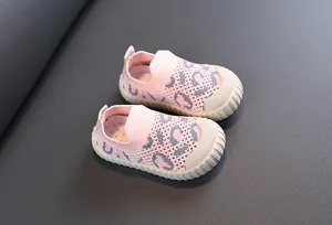 Detailed macro view of pink leopard print mesh toddler shoes with anti-slip soft soles