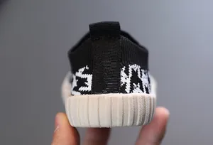 Detail view of the durable heel and textured sole on breathable mesh sneakers for kids