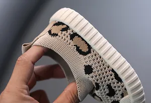Detail of breathable leopard print mesh toddler walking shoe with flexible sole