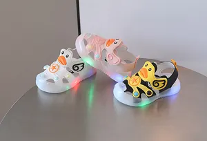 Detail view of baby LED light-up sandals featuring a cartoon duck design in three colors