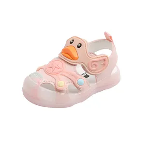 Close-up detail of pink LED toddler sandal featuring a cute cartoon duck and star design