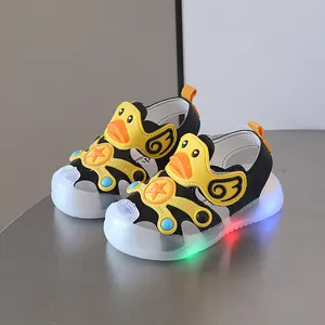 LED light-up baby sandals with cute cartoon duck design and soft anti-kick soles