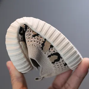 Flexible toddler walking shoes with breathable knit upper and extremely soft rubber sole.
