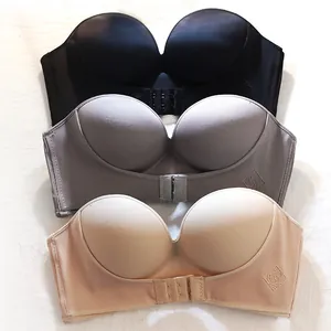 Set of breathable strapless front buckle bras for large cups in three neutral colors.