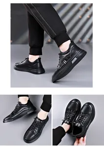 Detailed view of black men's casual sneakers with side branding and stylish thick sole.