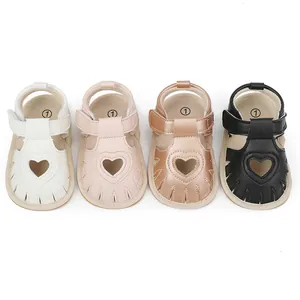 Detailed view of baby summer sandals featuring four colors with heart-shaped cutouts