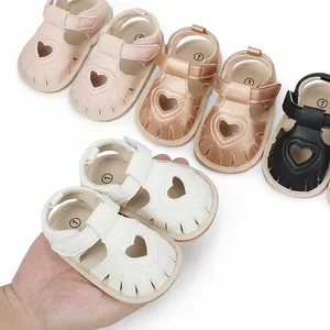 Selection of colorful infant summer walking sandals featuring a heart cutout design