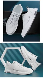 Detailed view of white trendy casual sneakers for men featuring fashion astronaut text