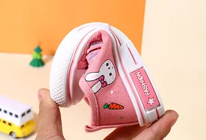 Flexible pink kids canvas shoe with cute rabbit embroidery and soft white rubber sole