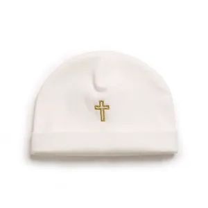 Soft white baby beanie hat featuring elegant gold embroidered cross for infants 0-2 years