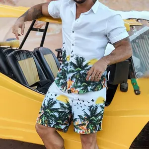 Model wearing white Hawaiian set with palm print leaning against a yellow beach buggy