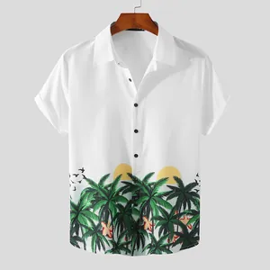 Detail showing tropical palm tree and sunset print on men's white Hawaiian beach shirt