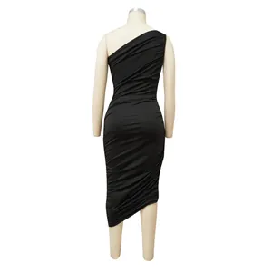 Detailed rear view of a black one-shoulder bodycon dress on a studio mannequin