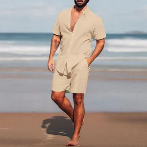 Summer men's beige two-piece shirt and shorts set showcased in a sunny beach setting