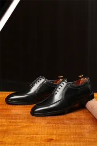 Zapatos Oxford clásicos de cuero negro para hombre con costuras elegantes y cordones