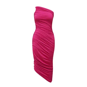 Detail view of fuchsia one-shoulder ruched bodycon dress with elegant draping.
