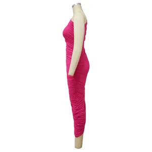 Side view of magenta one-shoulder ruched bodycon maxi dress showing elegant pleats